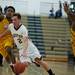 Dexter High School senior Brandon Bellottie drives up the court while defended by Ypsilanti on Friday, Feb. 15. Daniel Brenner I AnnArbor.com